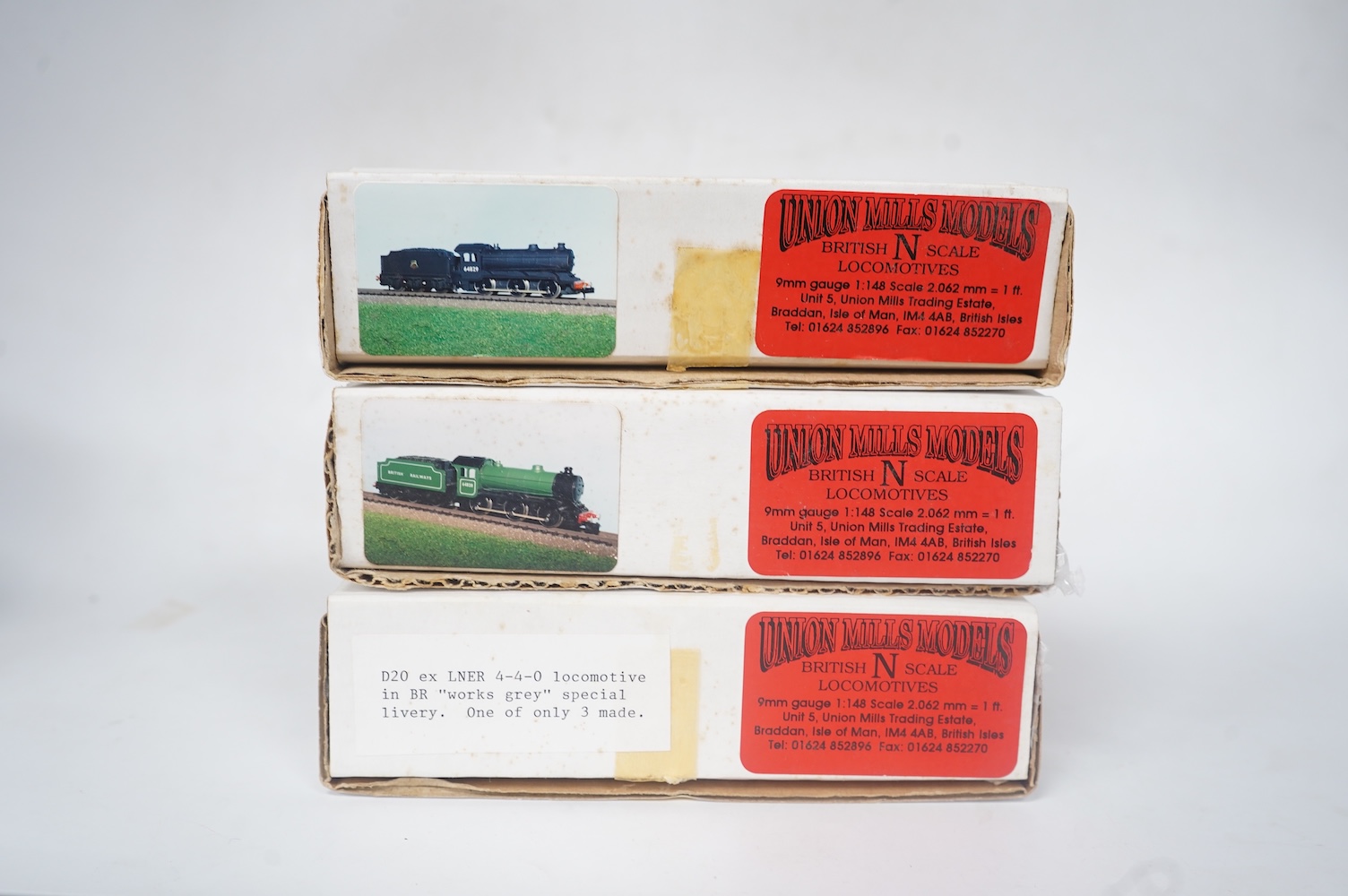 Three boxed Union Mills Models N gauge railway BR locomotives; a Class J39, 64820, a Class J39, unnumbered, and a Class D20 in ‘works grey’ livery, 62395. Condition - good.